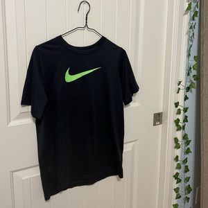 Black with green Nike symbol size XL tee shirt